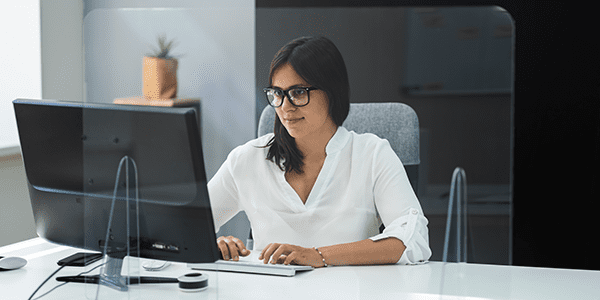 woman in computer with plastic divider